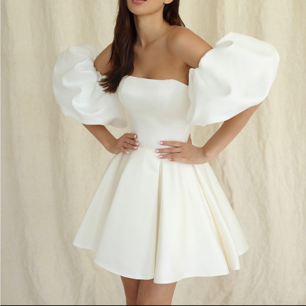 White dress with detachable sleeves